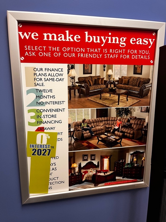 In-store signage displaying payment and financing options.