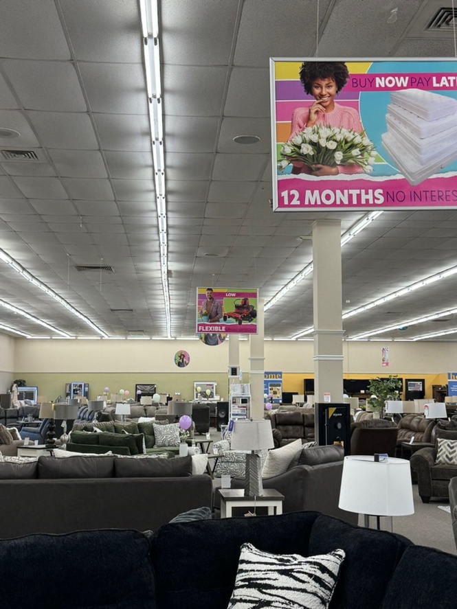Large in-store signage advertising easy in-house financing.